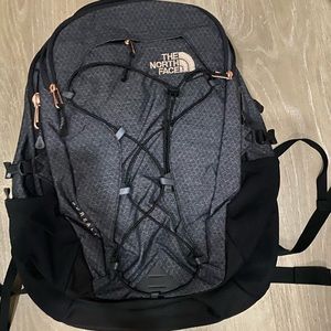 North Face black and rose gold detail back pack